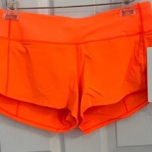 NWOT orange sped up Lululemon shorts